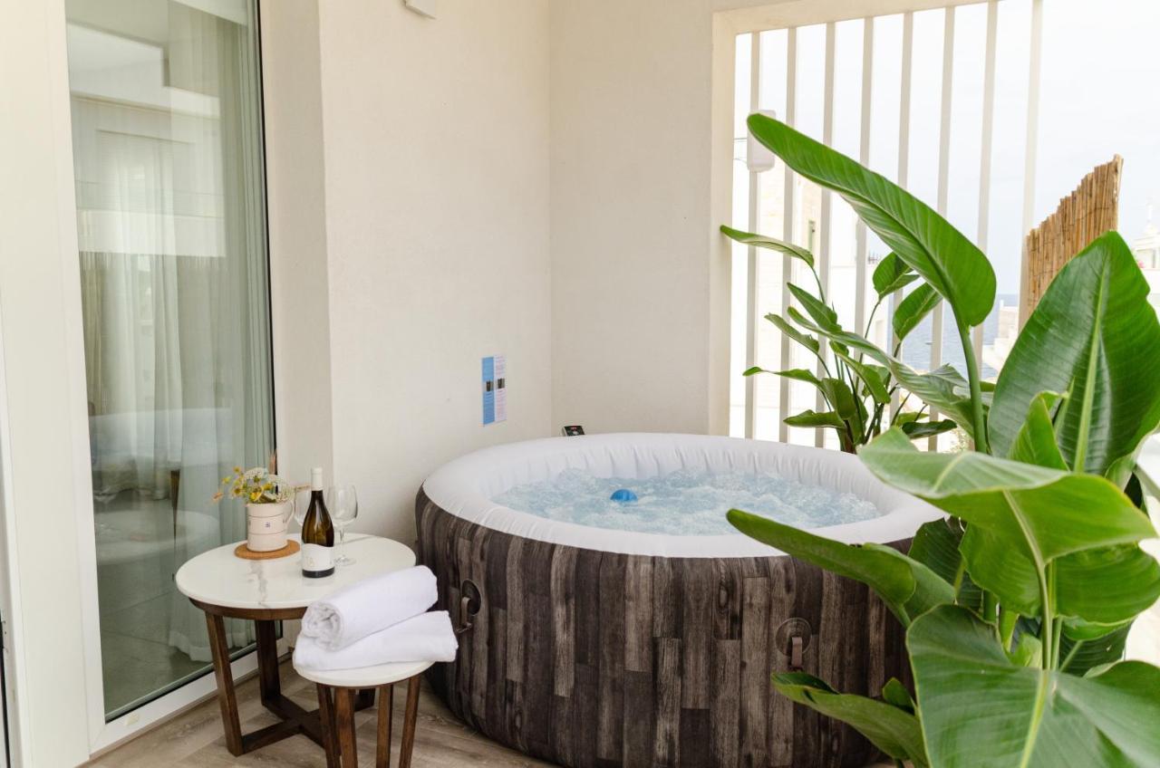 Apulialux Seaview Prestige Apt / Jacuzzi + Parking Daire Polignano a Mare Dış mekan fotoğraf